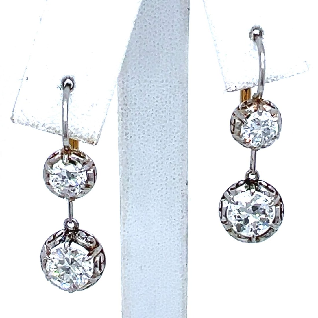 Vintage Art Deco Platinum and 18K Yellow Gold Diamond Earrings 2.05 Ct.: Vintage Art Deco Platinum and 18K Yellow Gold Diamond Earrings 2.05 Ct. Art Deco Platinum & 18K 2.05 Ct. Diamond Earrings. These exquisite vintage earrings are crafted from a combination of platinum a
