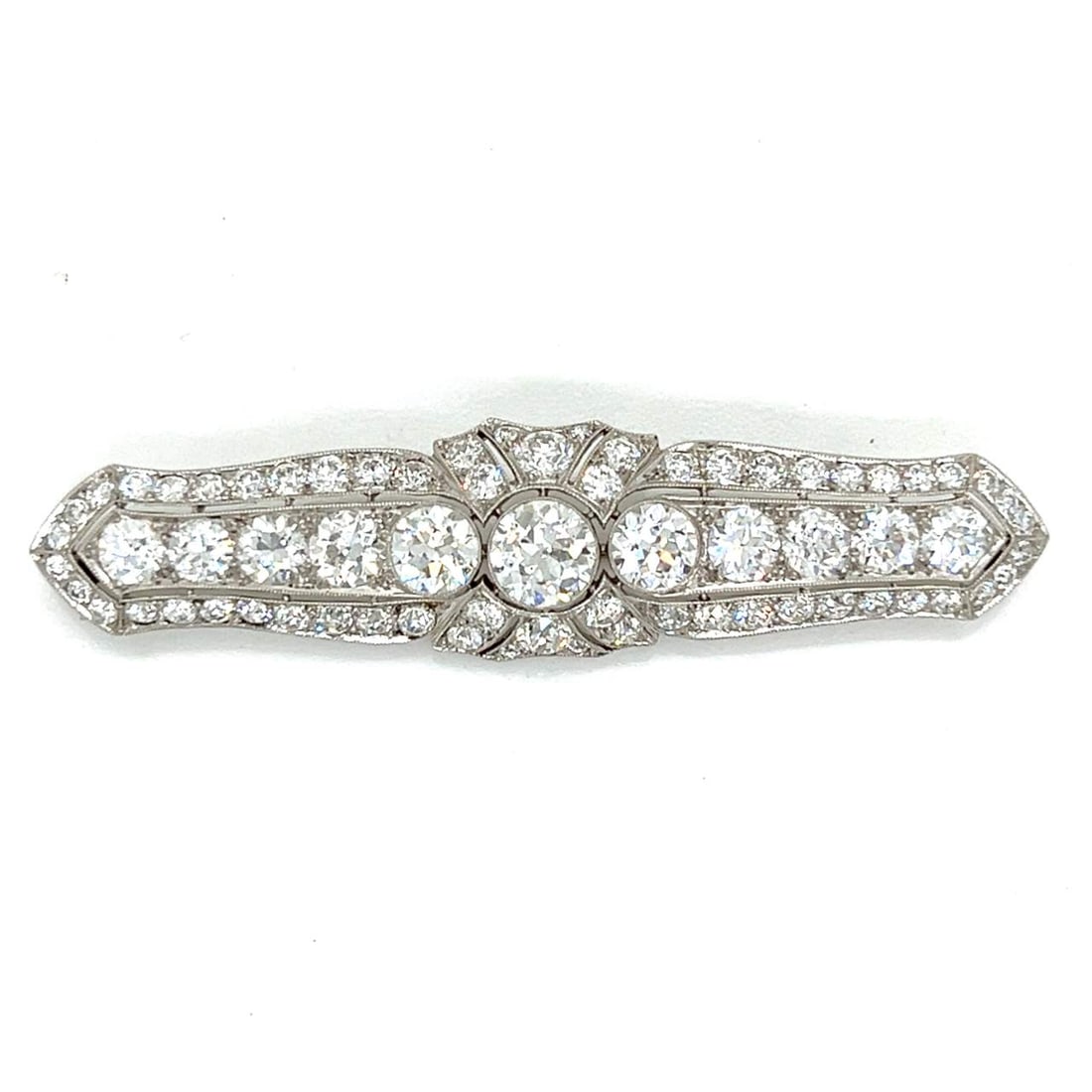 J.E. CALDWELL & CO. Art Deco 11.00 Ct. Diamond Brooch: J.E. CALDWELL & CO. Art Deco 11.00 Ct. Diamond Brooch Stone Type: Diamonds Metal Type: Platinum Other: Signed Vintage Appraisal Price: $38600 Comments: J.E. CALDWELL & CO. Art Deco 11.00 Ct. Diamond B