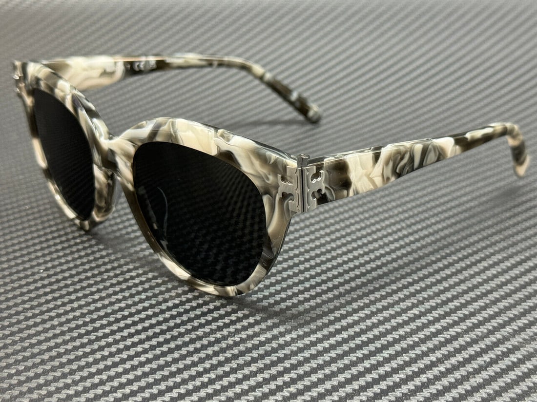 Tory Burch Marble Grey Women's 53mm Sunglasses: Tory Burch Marble Grey Women's 53mm Sunglasses Elevate your style with these TORY BURCH TY7209U 318387 sunglasses. Designed in a sophisticated Marble Grey hue, these sunglasses provide a chic accessor