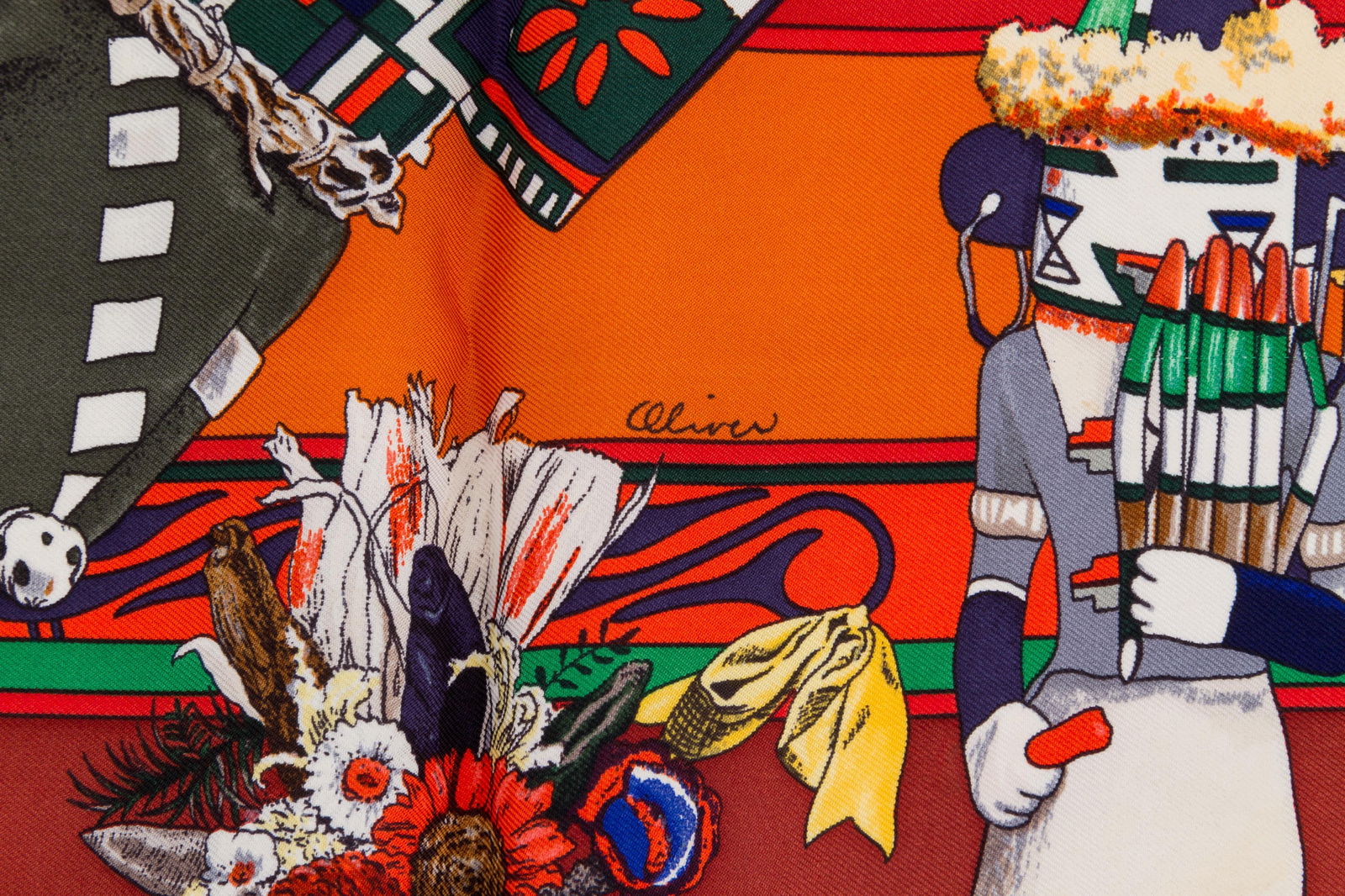 Hermes Rust Kachinas Silk Scarf 35 x 35 inches by Kermit Oliver: Hermes Rust Kachinas Silk Scarf 35 x 35 inches by Kermit Oliver This exquisite Hermes Rust Kachinas Silk Scarf by Kermit Oliver is a stunning addition to any collection. Crafted in France, this scarf