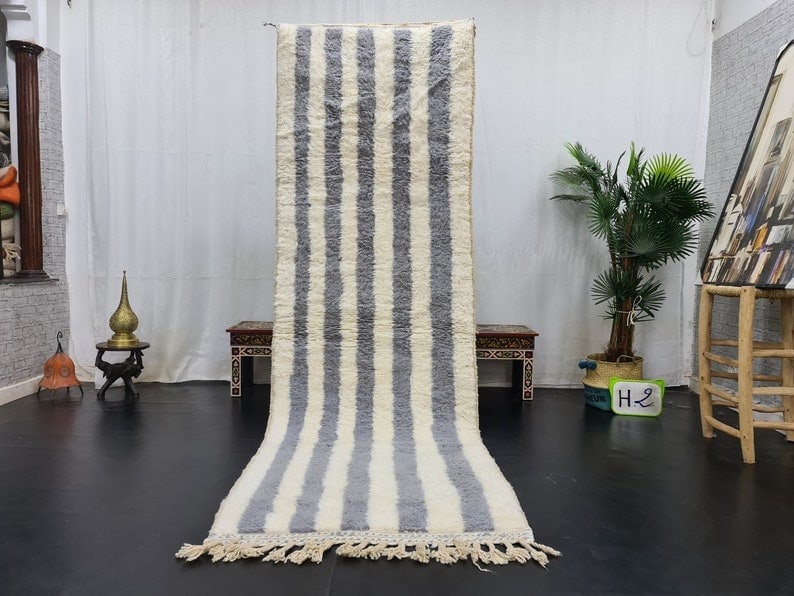 Handwoven Moroccan Runner Rug 2 Feet x 6.56 Feet: Handwoven Moroccan Runner Rug 2 Feet x 6.56 Feet Elegant Authentic Soft Runner Rug, handwoven in the Atlas Mountains by local Berber women weavers using traditional tools and natural local wool. Mater
