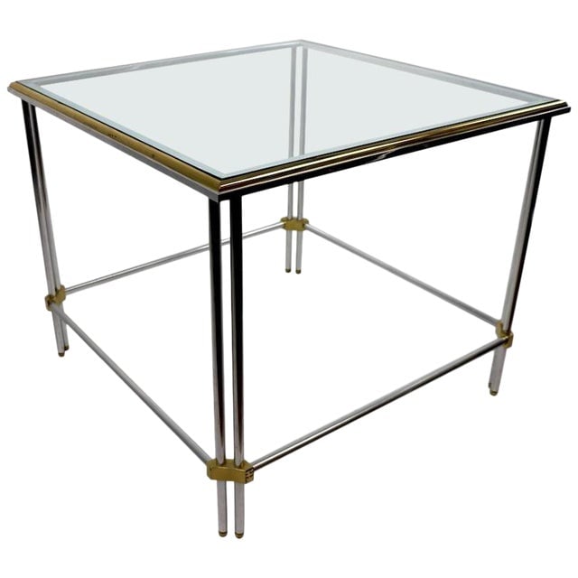 John Vesey Square End Table with Brass Feet and Glass Top: John Vesey Square End Table with Brass Feet and Glass Top Introducing an elegant square end or side table designed by renowned master John Vesey. This sophisticated piece features a plate glass top su