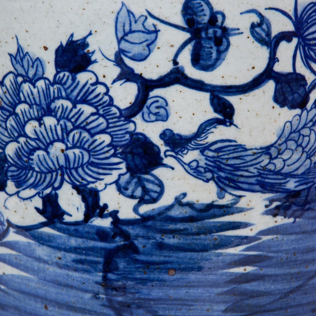 Hand-Crafted Ceramic Jar with Phoenix Design: Hand-Crafted Ceramic Jar with Phoenix Design Discover the allure of tradition with our Blue and White Ceramic Tea Jar a hand-crafted gem that stands at the intersection of art and utility. Standing pr