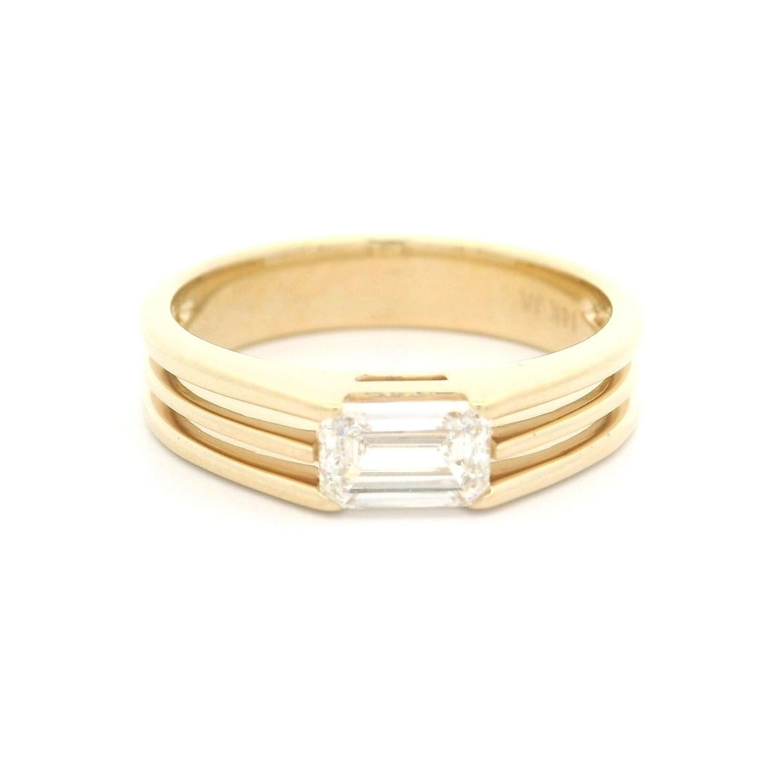 14k Yellow Gold GIA 0.80ct Emerald Cut Diamond Solitaire Ring: 14k Yellow Gold GIA 0.80ct Emerald Cut Diamond Solitaire Ring This exquisite solitaire ring features a stunning 0.80ct emerald-cut diamond, beautifully prong set in solid 14k yellow gold. The diamond
