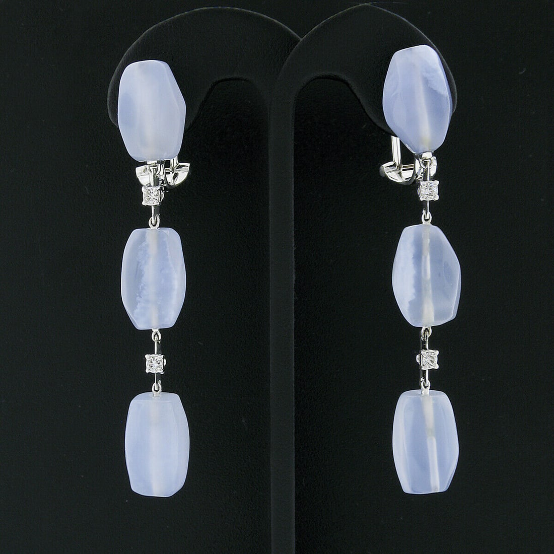 Antonini 18K White Gold Blue Chalcedony Diamond Dangle Earrings: Antonini 18K White Gold Blue Chalcedony Diamond Dangle Earrings These Antonini long drop dangle earrings are crafted from solid 18K white gold and feature a stunning combination of natural chalcedony
