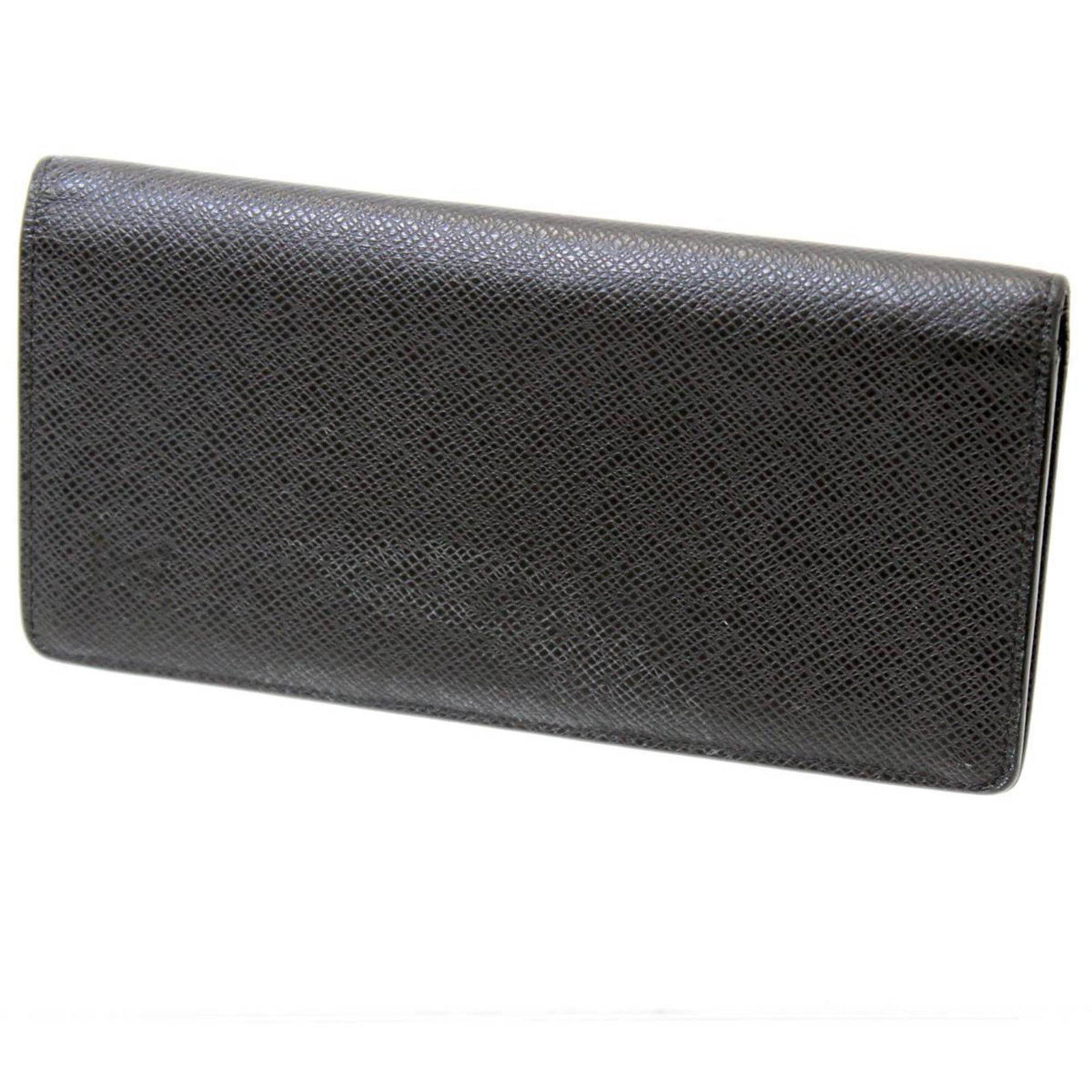 Louis Vuitton Taiga Noir Long Wallet Bi-Fold: Louis Vuitton Taiga Noir Long Wallet Bi-Fold Presenting the Louis Vuitton Portefeuille Brother Long Wallet, crafted from luxurious Taiga leather in an elegant Noir color. This bi-fold wallet is design