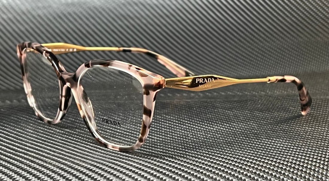 PRADA Pink Havana Gold Women's Eyeglasses 54mm Chic Style: PRADA Pink Havana Gold Women's Eyeglasses 54mm Chic Style Elevate your style with these PRADA PR 02ZV ROJ1O1 eyeglasses, featuring a chic pink Havana tortoiseshell pattern complemented by elegant gold