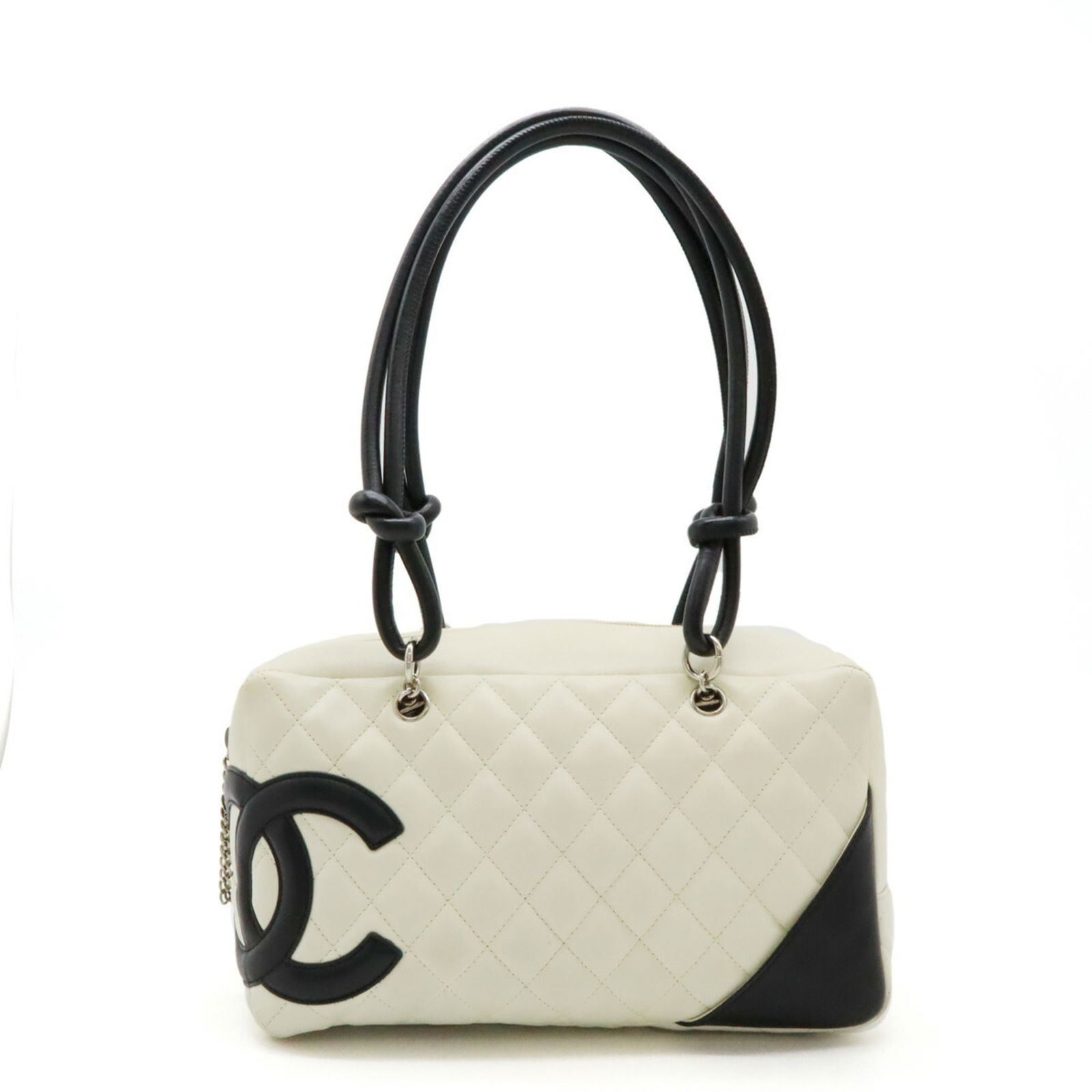 Chanel Cambon Line Shoulder Bag Black White: Chanel Cambon Line Shoulder Bag Black White This exquisite Chanel Cambon Line Bowling Shoulder Bag combines elegance with practicality. Crafted in a striking black and white leather, this bag features