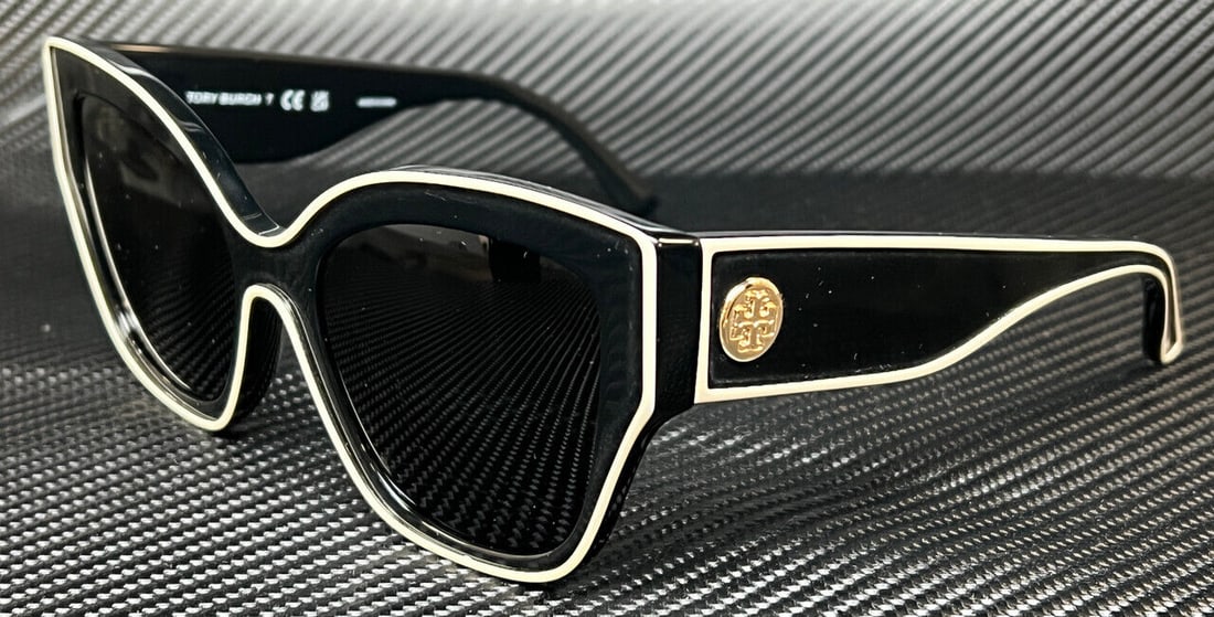 Tory Burch TY7184U 192987 Black Grey Women's Sunglasses: Tory Burch TY7184U 192987 Black Grey Women's Sunglasses Elevate your style with these Tory Burch women's sunglasses featuring a chic black frame and a bold cat-eye shape. The elegant design is accentu