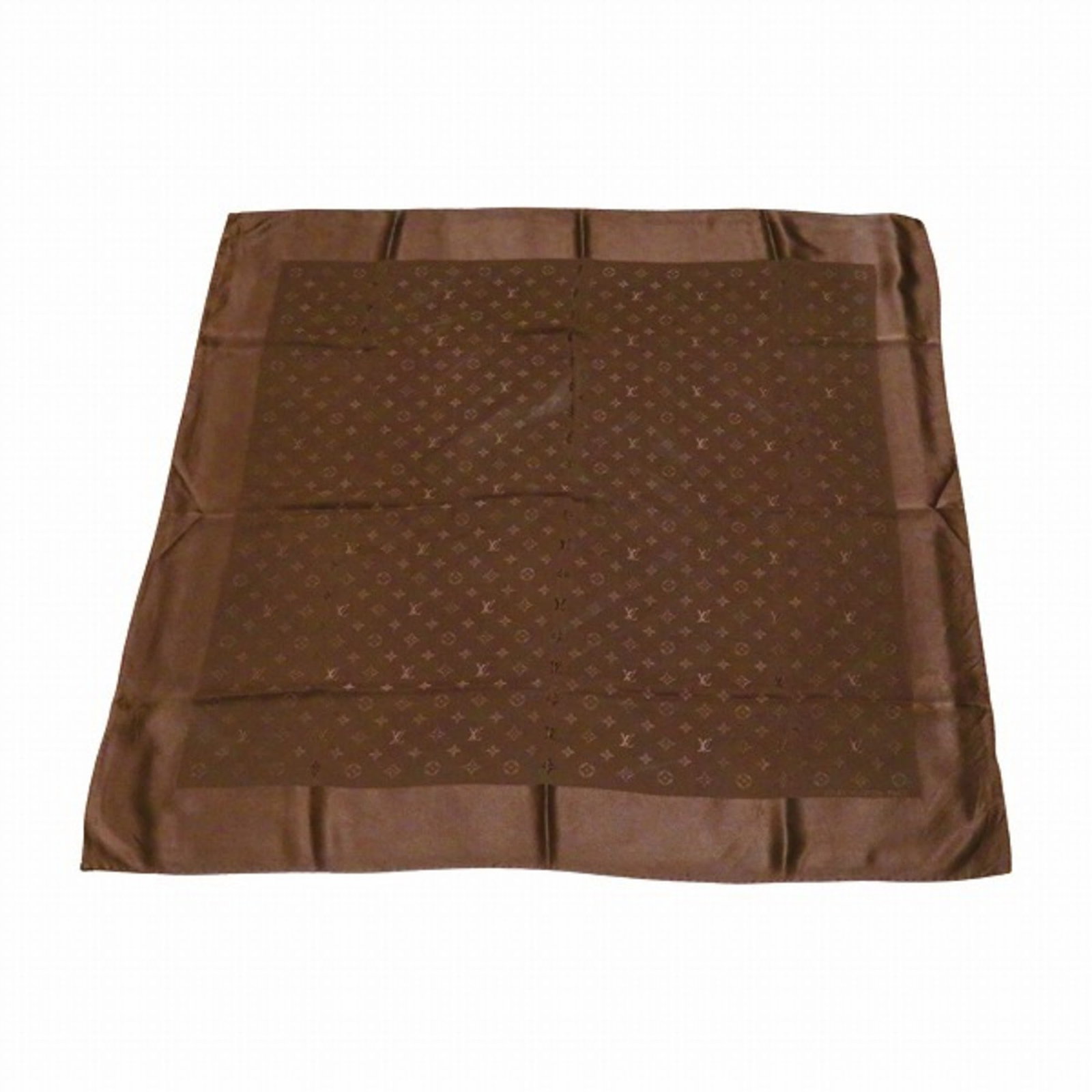 Louis Vuitton Monogram Brown Silk Scarf for Men and Women: Louis Vuitton Monogram Brown Silk Scarf for Men and Women This exquisite Louis Vuitton scarf showcases a luxurious brown silk fabric adorned with a repeated pattern of the iconic logo. Designed for bo