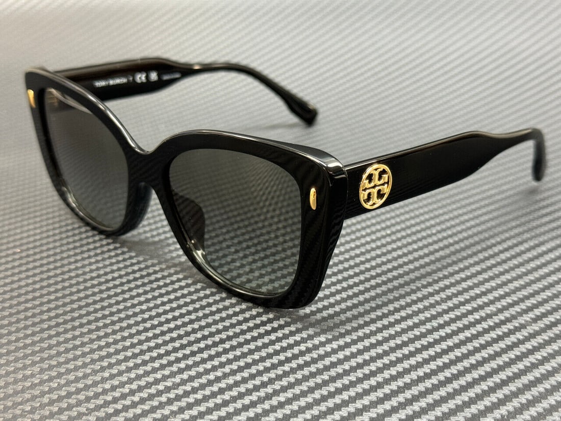 Tory Burch Black Grey Gradient Women's Sunglasses: Tory Burch Black Grey Gradient Women's Sunglasses Elevate your accessory game with these stylish Tory Burch TY7198U sunglasses. Featuring a chic black frame with a sophisticated grey gradient lens, th