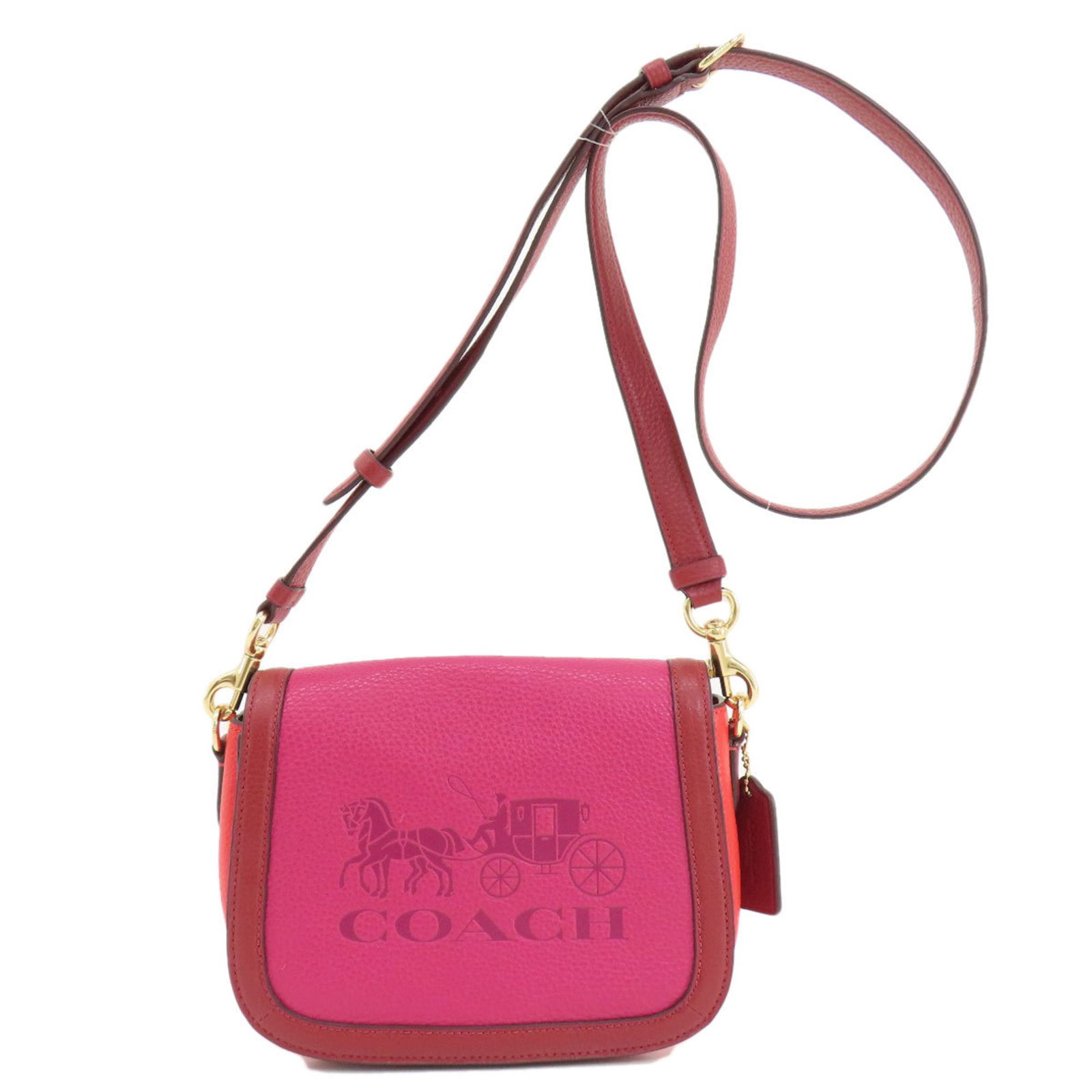 Pink and Red Leather Coach Shoulder Bag 18cm x 20cm: Pink and Red Leather Coach Shoulder Bag 18cm x 20cm This stylish Coach shoulder bag is crafted from high-quality leather, making it a chic addition to any women's wardrobe. The bag showcases a classic
