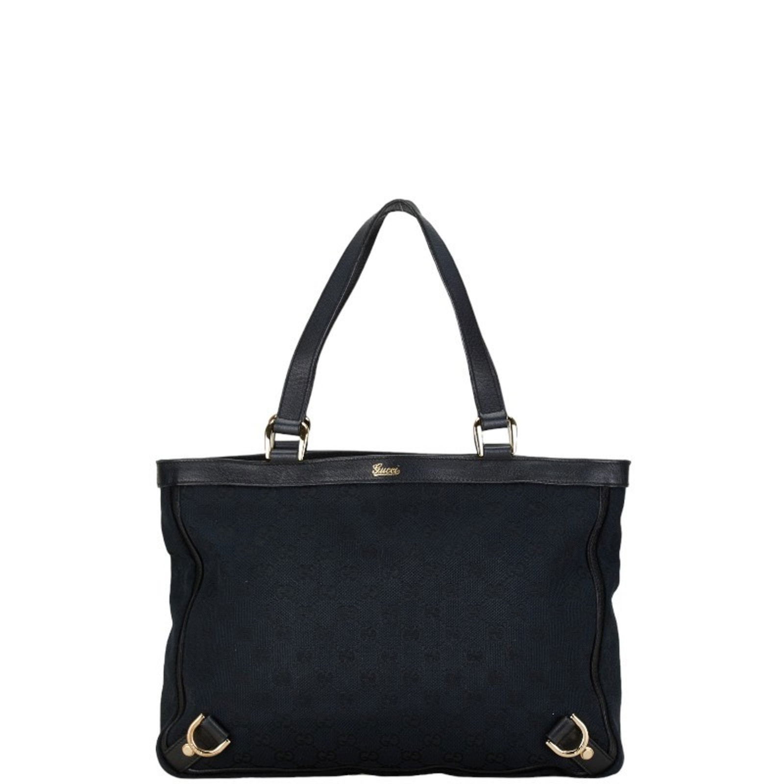 Gucci GG Canvas Tote Bag Black Leather Women's: Gucci GG Canvas Tote Bag Black Leather Women's This stylish Gucci GG Canvas Tote Bag is perfect for the modern woman seeking both elegance and functionality. Crafted from a blend of canvas and leather
