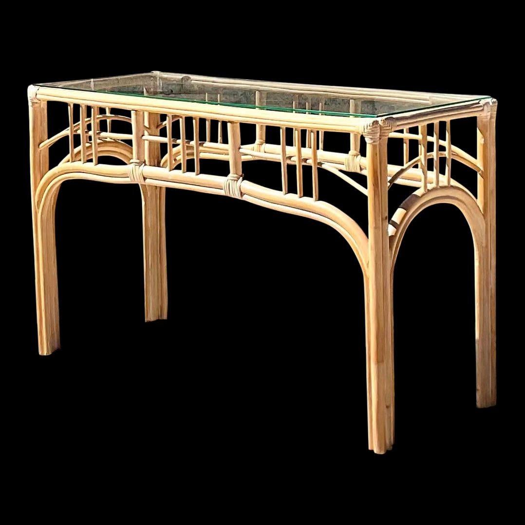 Vintage Coastal Rattan Console Table: Vintage Coastal Rattan Console Table Gorgeous vintage Coastal console table. Made from a chic cerused rattan in a simple design. Glass top that rests on the surface. Acquired from a Palm Beach estate.
