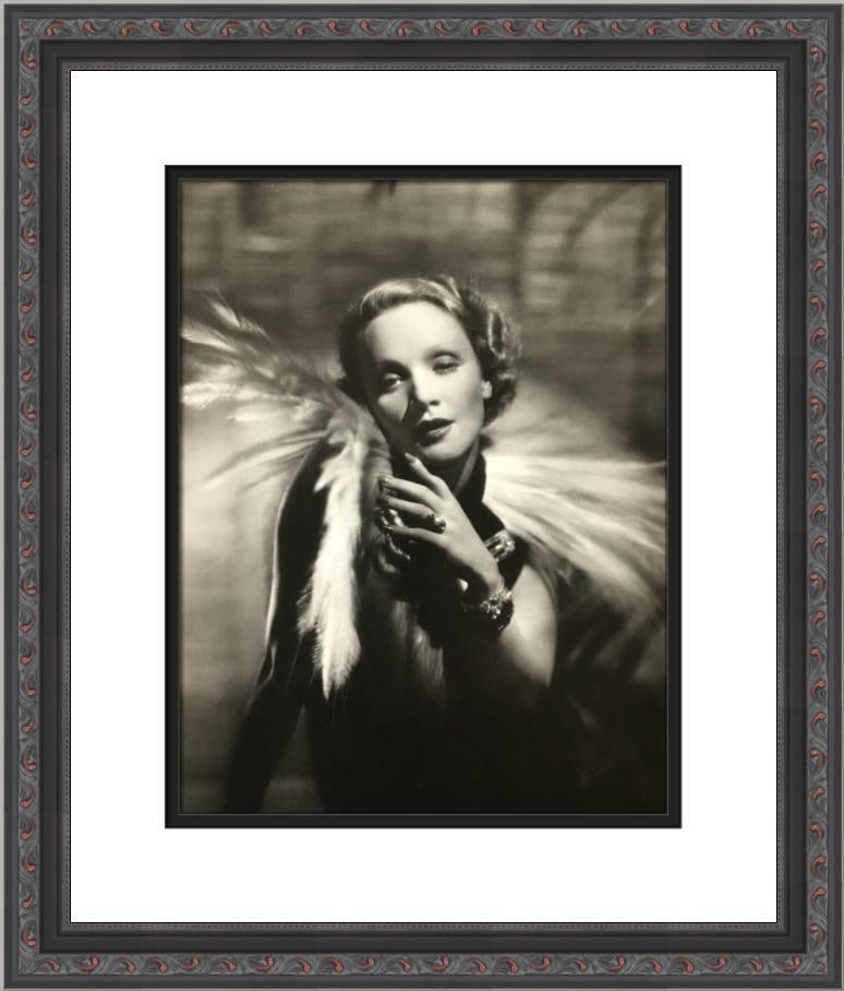 Marlene Dietrich Black & White Print Custom Framed 15 x 17.5: Marlene Dietrich Black & White Print Custom Framed 15 x 17.5 This beautifully custom framed black and white print features the iconic Marlene Dietrich, showcasing her elegance with a feather boa. The 