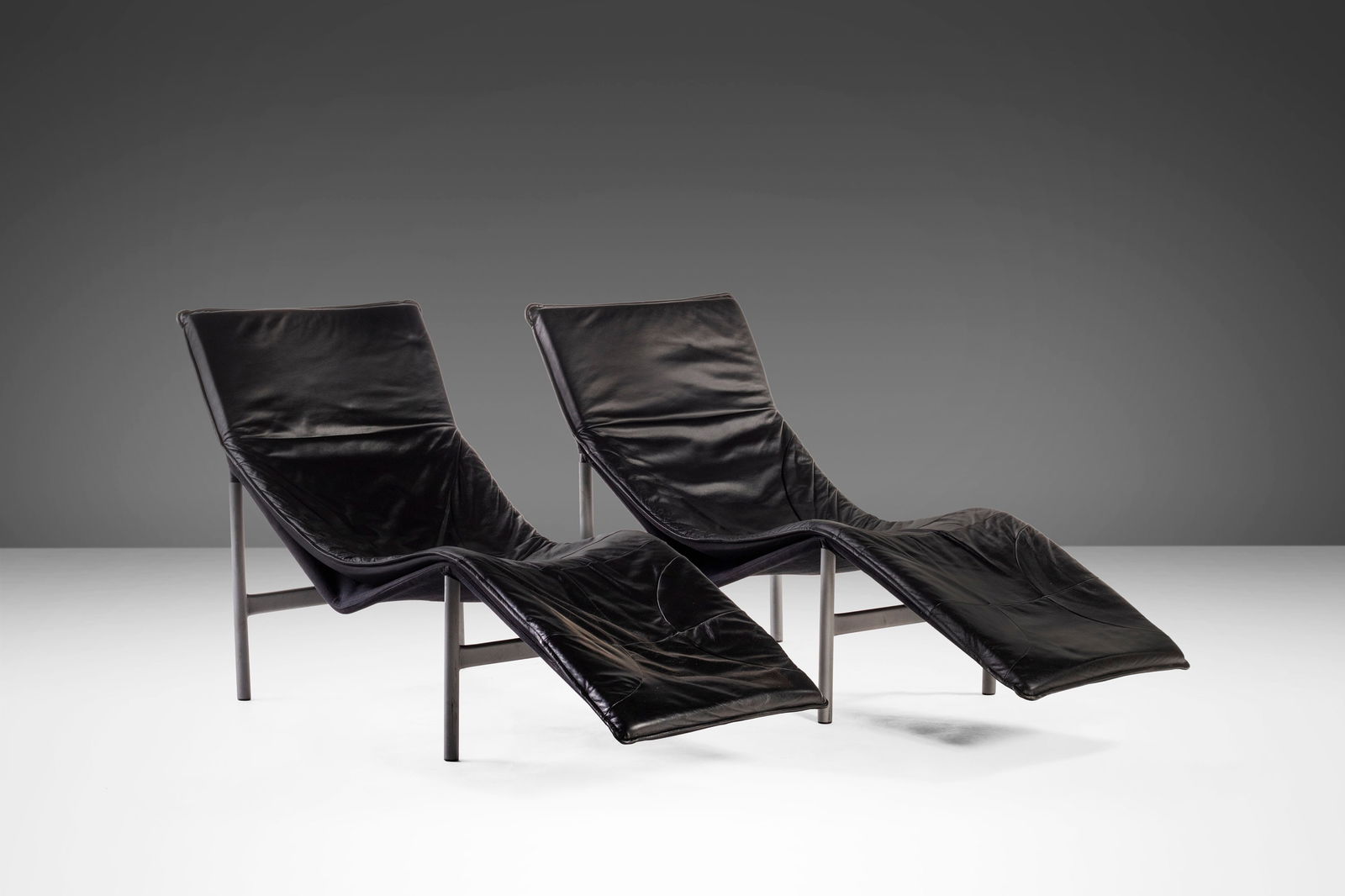 Set of Two (2) Modern Skye Leather Chaise Lounge Chairs c. 1970's: Set of Two (2) Modern Skye Leather Chaise Lounge Chairs c. 1970's This exquisite set of two Skye Leather Chaise Lounge Chairs, designed by Tord Bjrklund in the 1970s, combines comfort with a sleek mod