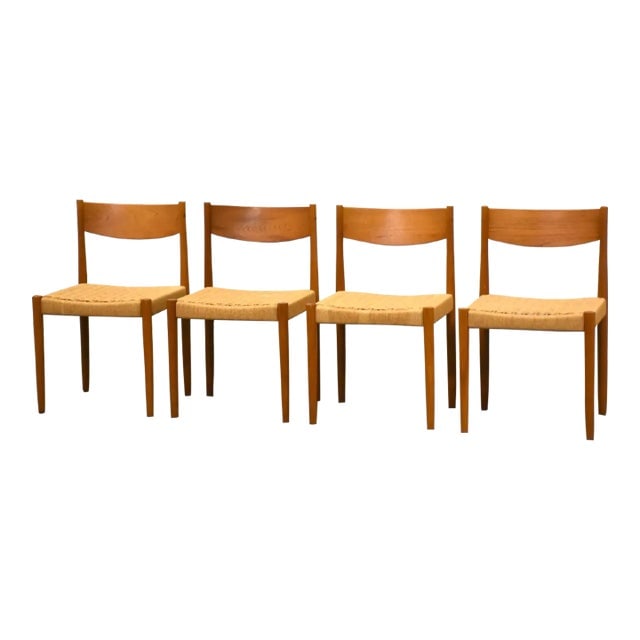 1960s Danish Modern Teak Dining Chairs - Set of 4: 1960s Danish Modern Teak Dining Chairs - Set of 4 This exquisite set of four mid-century modern dining chairs, designed by Poul Volther, features elegant teak wood frames complemented by woven paper c