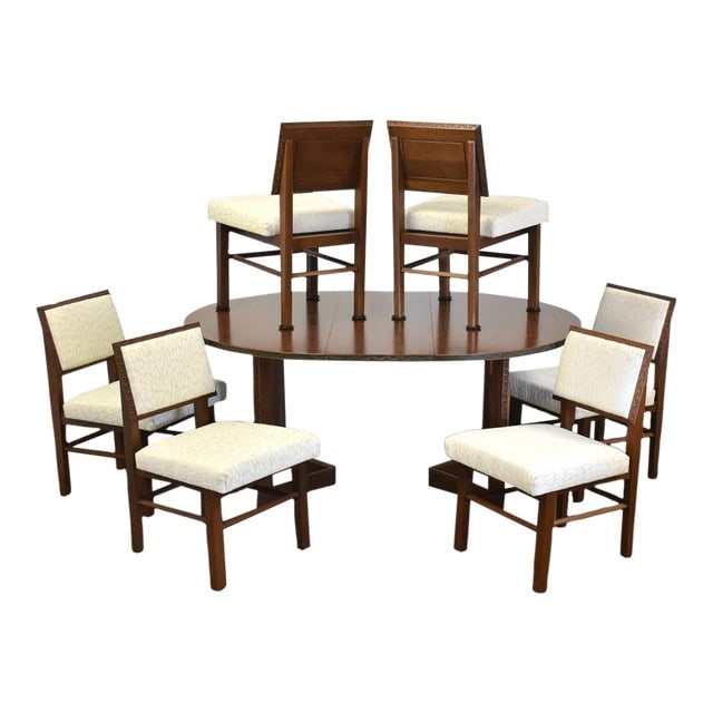 Frank Lloyd Wright Taliesin Dining Table and Chairs - Set of 7: Frank Lloyd Wright Taliesin Dining Table and Chairs - Set of 7 A mid century modern dining table and six chairs designed by Frank Lloyd Wright for Henredon's Taliesin Line. Off white fabric in excelle
