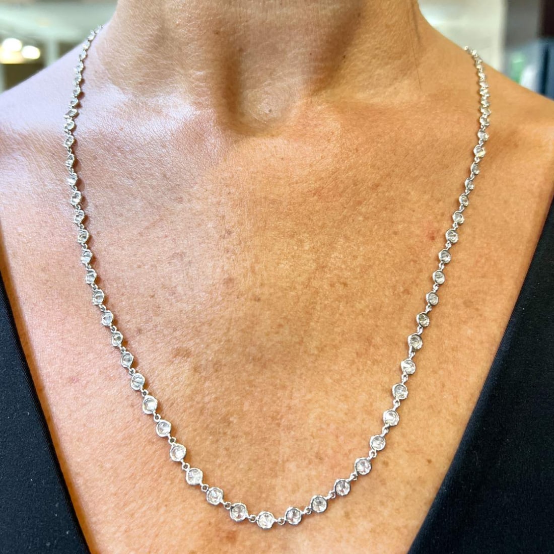 27" Platinum 18K White Gold 12.25 Ct Diamond Necklace: 27" Platinum 18K White Gold 12.25 Ct Diamond Necklace This exquisite Diamond by the Yard Necklace features a stunning array of 90 diamonds, meticulously set in a luxurious combination of platinum and 