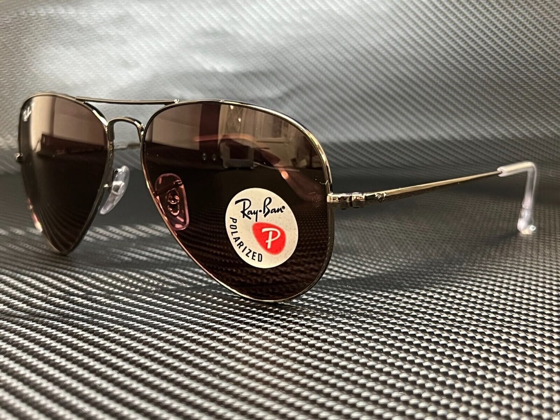 Ray Ban RB3689 004 AF Gunmetal Pilot Sunglasses: Ray Ban RB3689 004 AF Gunmetal Pilot Sunglasses Discover the perfect blend of style and functionality with these Ray-Ban RB3689 polarized sunglasses. Designed in a classic aviator style, these unisex