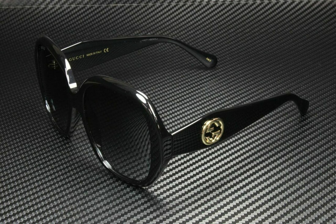 Gucci GG0796S-001 Black Gray Round Sunglasses: Gucci GG0796S-001 Black Gray Round Sunglasses Elevate your accessory collection with these stylish Gucci GG0796S 001 sunglasses. Featuring a chic round design, these oversized sunglasses come in a cla