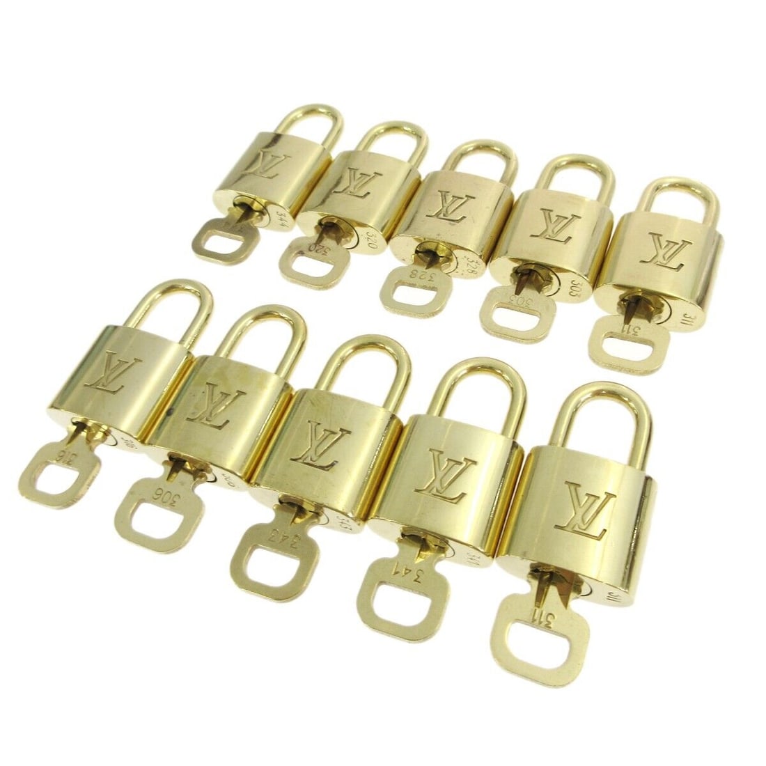 Louis Vuitton Padlock & Key Bag Accessories Charm Gold: Louis Vuitton Padlock & Key Bag Accessories Charm Gold Enhance your Louis Vuitton collection with this exquisite 10-piece set of padlocks and keys. Each charm features a stunning gold-tone finish, emb