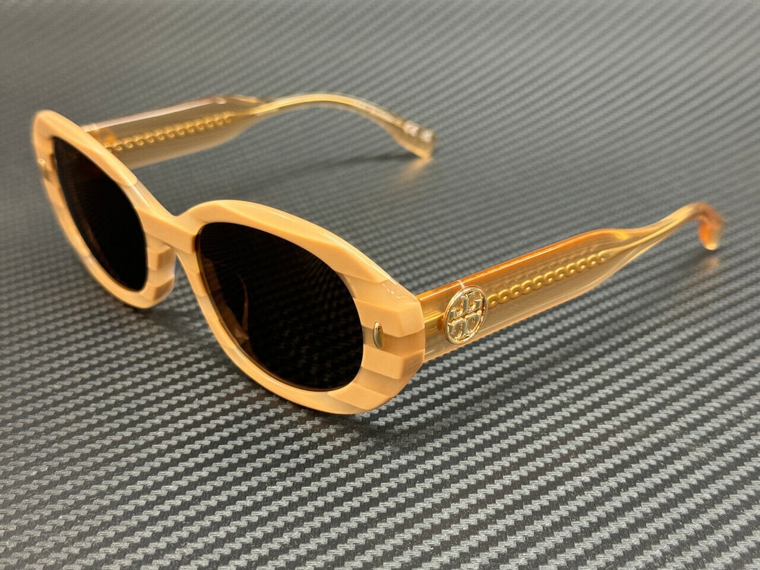 Tory Burch TY7214U 318173 Brown Women's Sunglasses: Tory Burch TY7214U 318173 Brown Women's Sunglasses Elevate your style with these Tory Burch TY7214U 318173 sunglasses. Featuring a unique octagonal frame in a rich brown color, these sunglasses are de