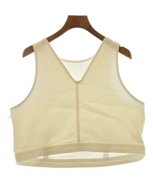 White Vest M: White Vest M This stylish women's vest by woadblue features a classic V-neck design, perfect for layering or wearing on its own. The vest is crafted in a pristine white color, making it a versatile ad