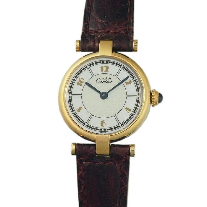 Cartier Must Vendome Vermeil W1009854 Women's Quartz Wristwatch: Cartier Must Vendome Vermeil W1009854 Women's Quartz Wristwatch Experience timeless elegance with this Cartier Must Vendome wristwatch designed for women. Featuring a classic white face, this exquisit