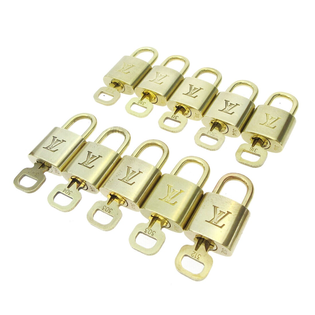 Gold Padlock & Key Bag Accessories Charm 10 Piece Set: Gold Padlock & Key Bag Accessories Charm 10 Piece Set Enhance your Louis Vuitton collection with this exquisite 10 Piece Padlock & Key Bag Accessories Charm set. Crafted in a luxurious gold color, thi