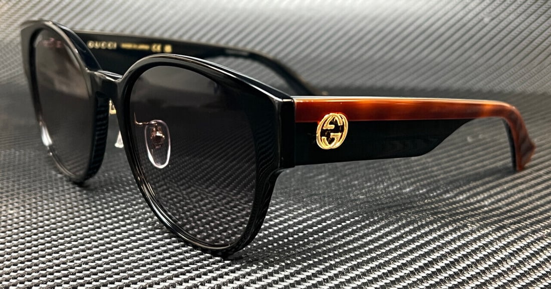 GUCCI GG1304SK 001 Black Grey Women's Sunglasses: GUCCI GG1304SK 001 Black Grey Women's Sunglasses Experience luxury and style with these GUCCI GG1304SK sunglasses, designed for women. Featuring a sleek black frame and sophisticated tortoiseshell arm