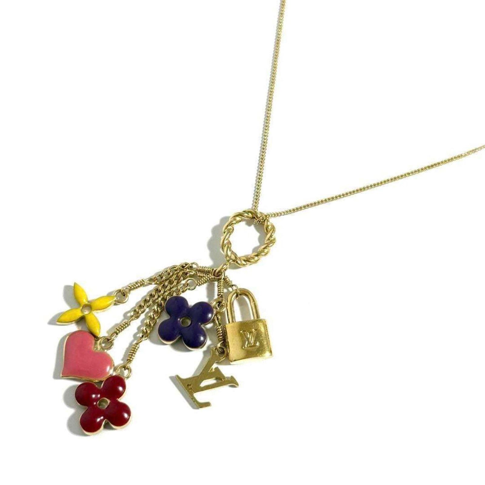 Louis Vuitton Sweet Monogram Pendant Necklace: Louis Vuitton Sweet Monogram Pendant Necklace Elevate your accessory collection with this exquisite Louis Vuitton Sweet Monogram Necklace. This stunning piece features a gold-tone finish and showcases