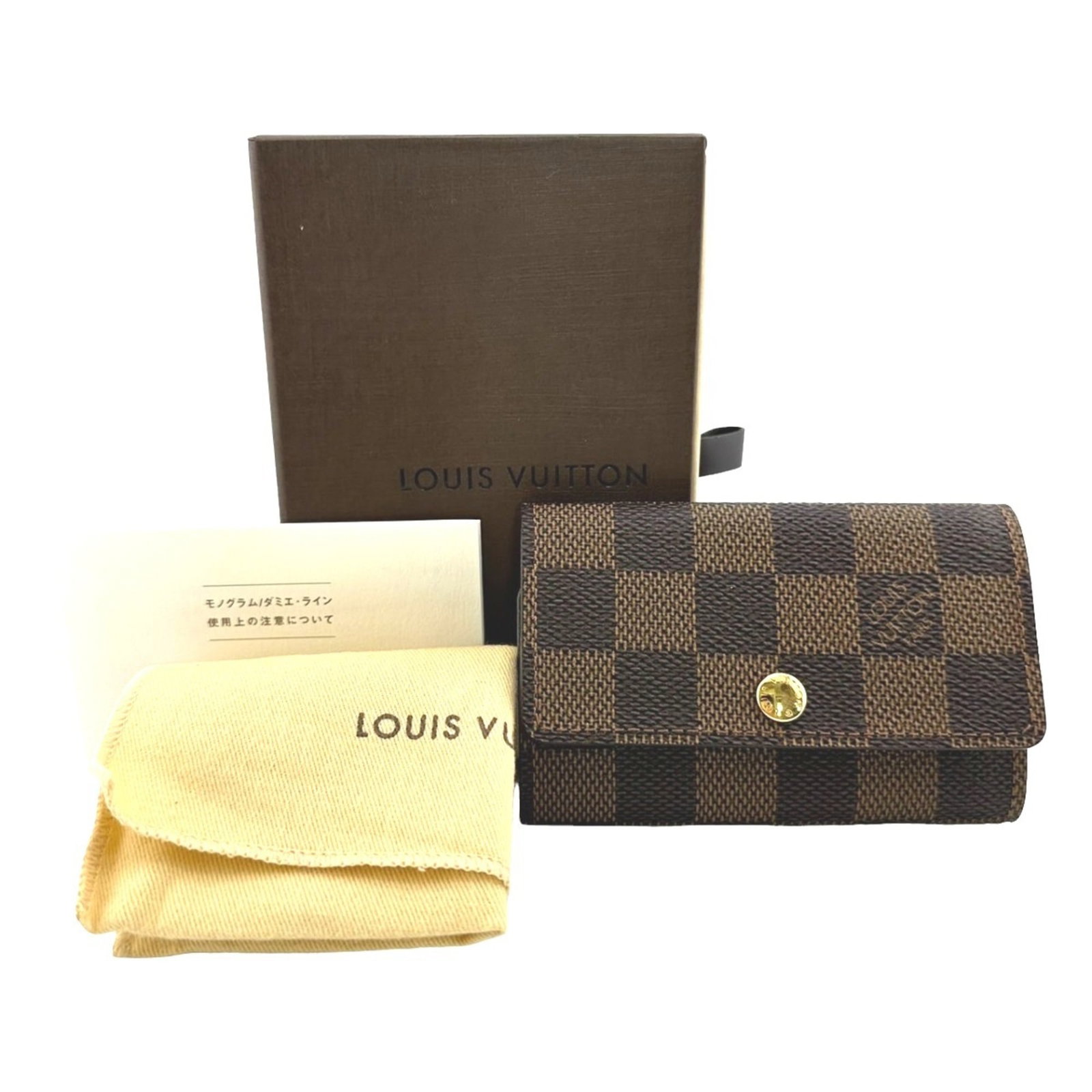Louis Vuitton Key Case for 6 Damier Multicle Canvas Brown: Louis Vuitton Key Case for 6 Damier Multicle Canvas Brown This Louis Vuitton Key Case is designed for both men and women, featuring the iconic Damier Multicle Canvas in a sophisticated brown color. Me