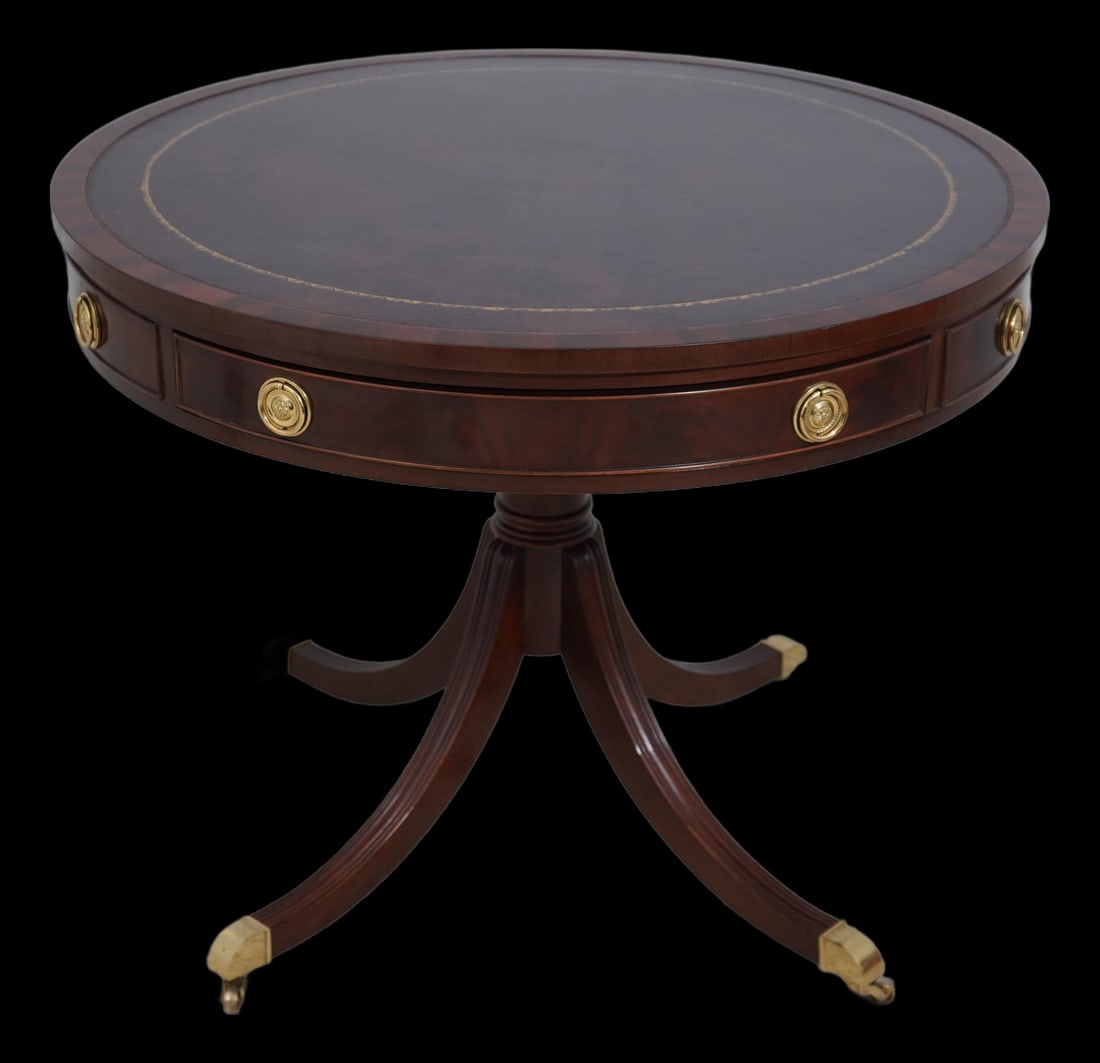 Figural Mahogany Round Drum Table with Leather Top: Figural Mahogany Round Drum Table with Leather Top This exquisite round drum table features a rich mahogany construction with a beautifully tooled leather top. Designed in the traditional Duncan Phyfe