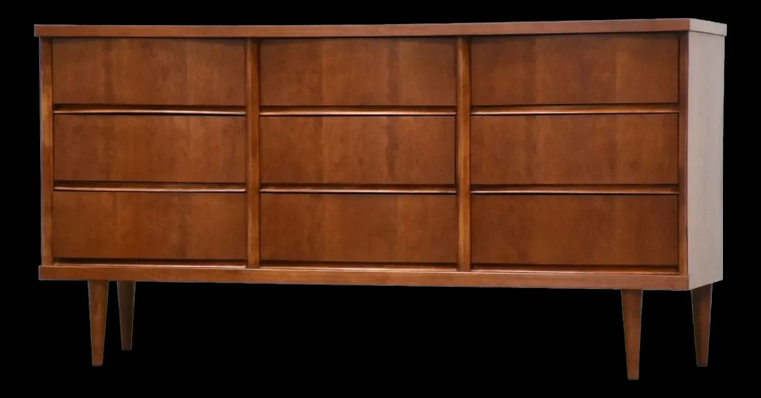 Mid Century Modern Cherry Nine Drawer Dresser: Mid Century Modern Cherry Nine Drawer Dresser This elegant mid-century modern dresser features a refined cherry wood finish and showcases a classic bow front design. It is equipped with nine spacious