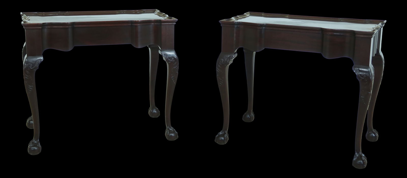 C.1920s Chippendale Style Mahogany Bench with Ball & Claw Feet: C.1920s Chippendale Style Mahogany Bench with Ball & Claw Feet This exquisite pair of Newport Mahogany Tea Tables, crafted in the 1920s, showcases elegant ball and claw feet alongside fine carved deta