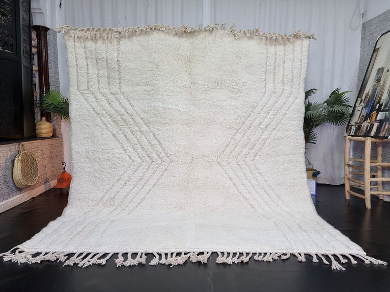Handwoven White Engraved Rug 10 x 6.56 Feet Wool Morocco: Handwoven White Engraved Rug 10 x 6.56 Feet Wool Morocco This stunning authentic white engraved rug is handwoven by local Berber women in the Atlas Mountains of Morocco, utilizing traditional tools an