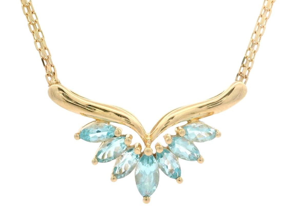 14K Yellow Gold 2.0ct Marquise Blue Topaz Pendant Necklace 17" Bismark Chain: 14K Yellow Gold 2.0ct Marquise Blue Topaz Pendant Necklace 17" Bismark Chain This stunning necklace features a captivating V spray pendant adorned with seven natural marquise-cut Swiss blue topaz ston
