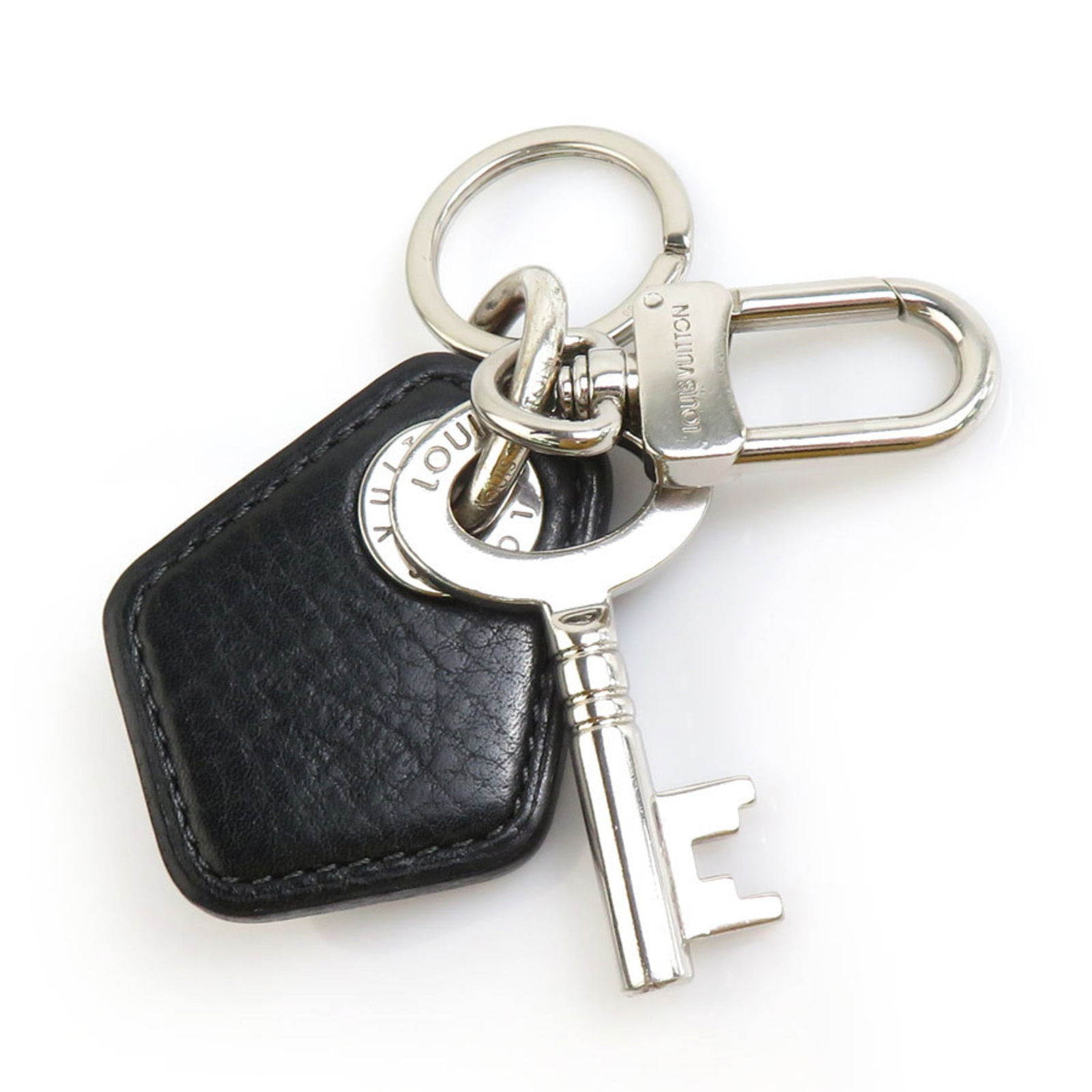 Louis Vuitton Key Ring Charm Black Leather Silver Metal Unisex M66137: Louis Vuitton Key Ring Charm Black Leather Silver Metal Unisex M66137 Elevate your accessory collection with this sophisticated Louis Vuitton Charm Key Ring, expertly crafted in a stylish combination