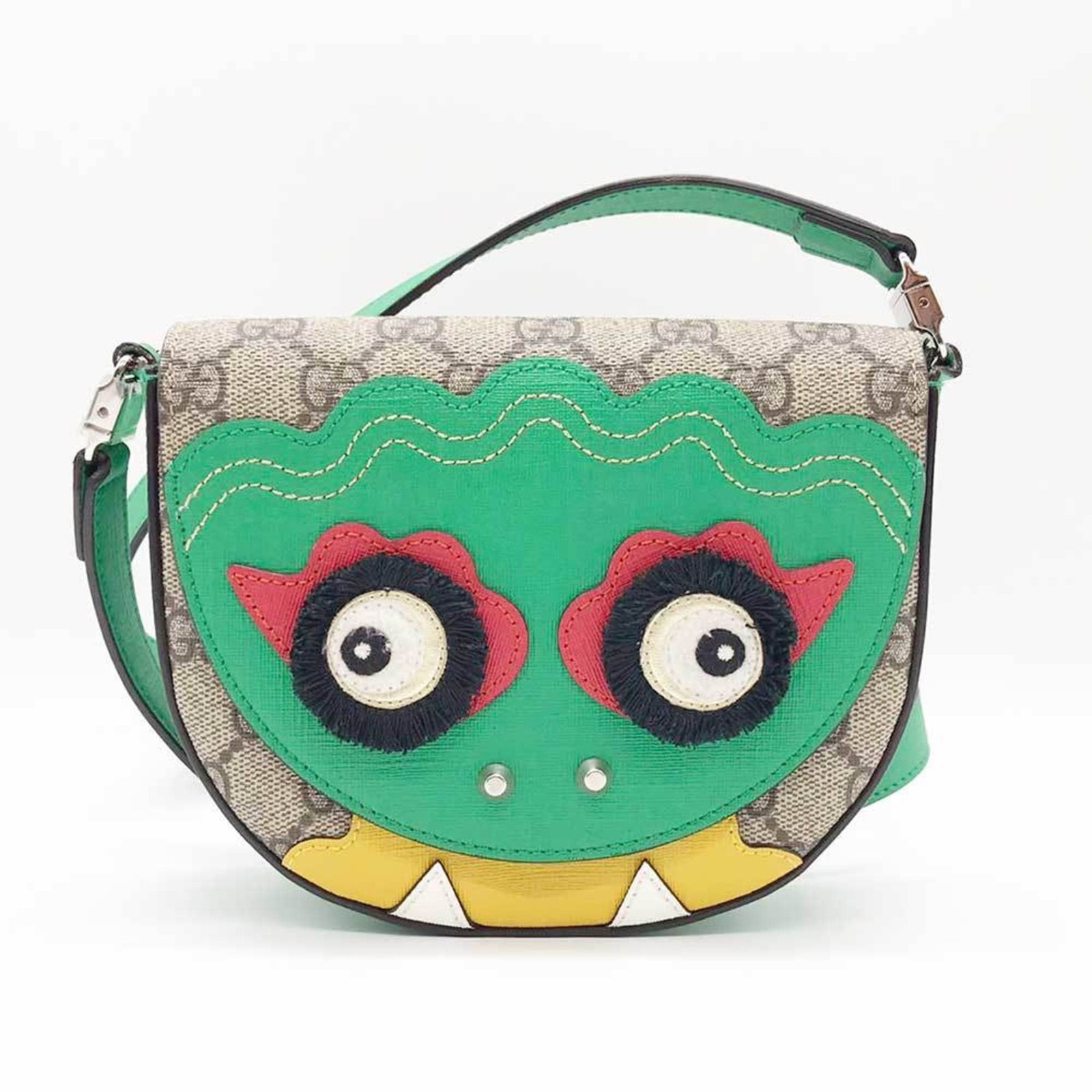 Gucci 457352 Green Beige PVC Leather Shoulder Bag Women: Gucci 457352 Green Beige PVC Leather Shoulder Bag Women This exquisite Gucci shoulder bag showcases a stylish combination of beige and green PVC leather, perfect for the modern woman. Featuring a secu