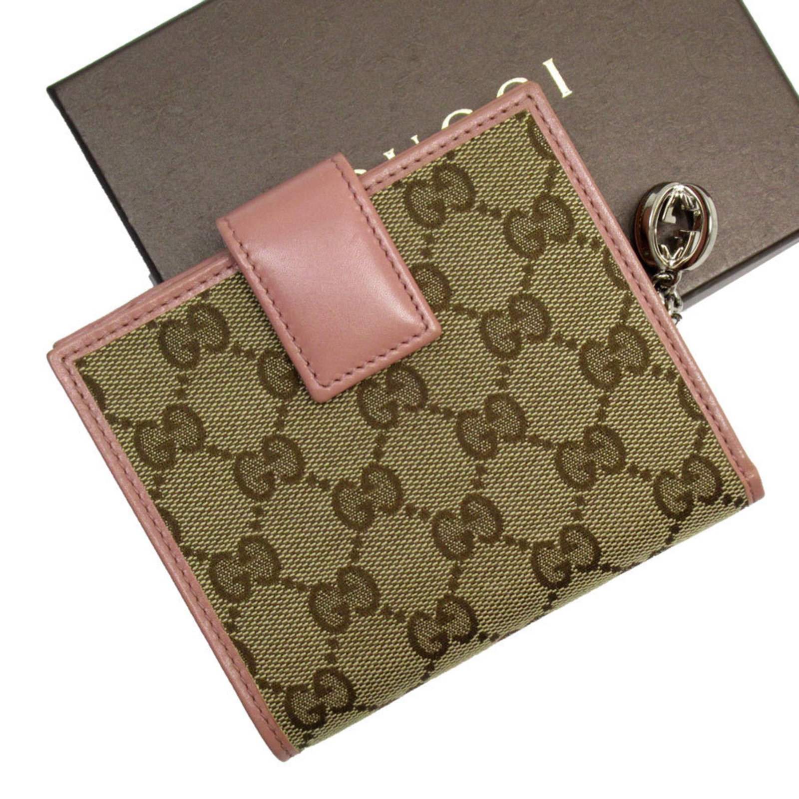 GUCCI Bi-Fold Wallet GG Canvas Beige Pink Women's 233022: GUCCI Bi-Fold Wallet GG Canvas Beige Pink Women's 233022 This exquisite GUCCI bi-fold wallet is crafted from signature GG canvas and features a chic beige pink color scheme, perfect for the stylish wo