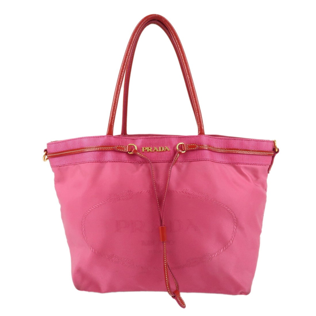 PRADA Nylon Patent Leather Logo Tote Bag Pink Red Vintage: PRADA Nylon Patent Leather Logo Tote Bag Pink Red Vintage This stylish PRADA Tote Bag showcases a vibrant combination of pink and red, crafted from durable nylon patent leather. The bag features a sec