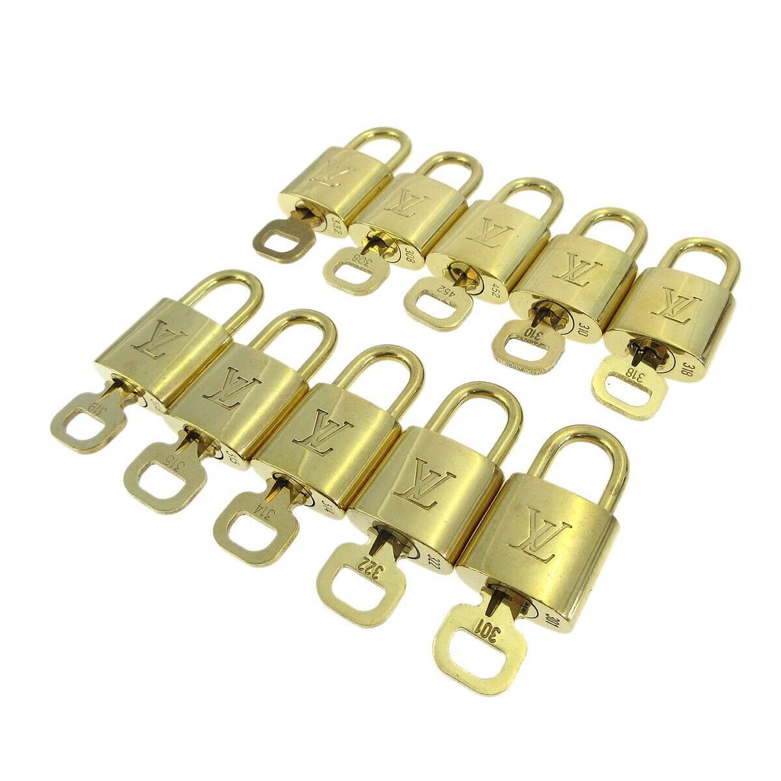 LOUIS VUITTON Padlock & Key Bag Accessories Charm 10 Piece Set Gold-tone: LOUIS VUITTON Padlock & Key Bag Accessories Charm 10 Piece Set Gold-tone Enhance your Louis Vuitton collection with this exquisite 10-piece set of padlock and key bag accessories charm. Crafted in a s