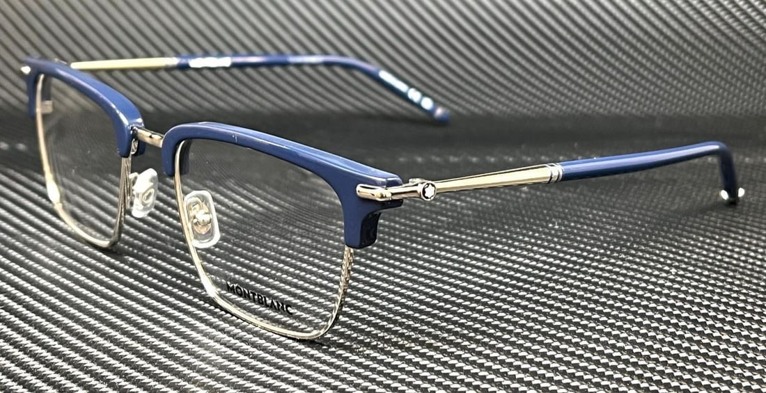Mont Blanc MB0243O 005 Blue Extra Large 54mm Men's Eyeglasses: Mont Blanc MB0243O 005 Blue Extra Large 54mm Men's Eyeglasses Discover the elegance of Mont Blanc MB0243O 005 eyeglasses, designed for the modern man. The extra-large frame in a sophisticated blue hue