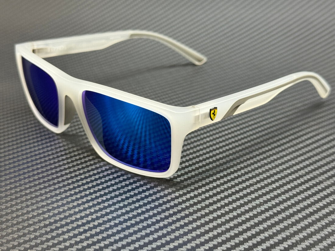 Ferrari FZ6003U 505 25 Matte Opal Blue Mirror 59mm Sunglasses: Ferrari FZ6003U 505 25 Matte Opal Blue Mirror 59mm Sunglasses Elevate your style with these Ferrari FZ6003U 505 25 Matte Opal Blue Mirror Men's Sunglasses, featuring a striking white frame. These sung