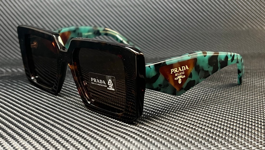 PRADA PR 23YSF 2AU06B Brown Havana 52mm Women's Sunglasses: PRADA PR 23YSF 2AU06B Brown Havana 52mm Women's Sunglasses Introducing the PRADA PR 23YSF 2AU06B Sunglasses, designed for the stylish woman. These sunglasses feature a sophisticated Brown Havana frame