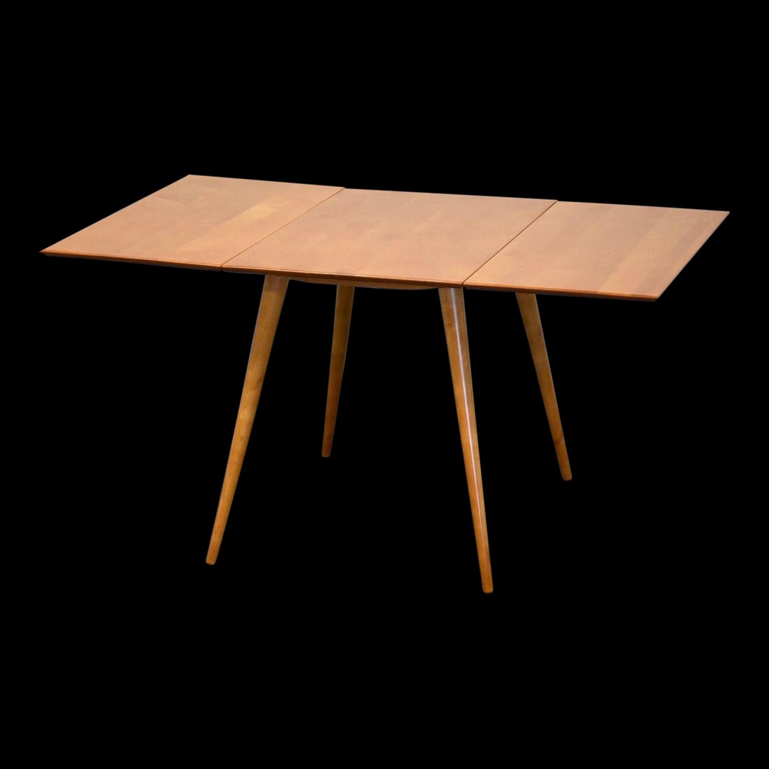 Paul McCobb Planner Group Maple Dining Table Mustard 56.375" L: Paul McCobb Planner Group Maple Dining Table Mustard 56.375" L Explore the elegance of mid-century modern design with this exquisite dining table from the Paul McCobb Planner Group. Crafted from rich