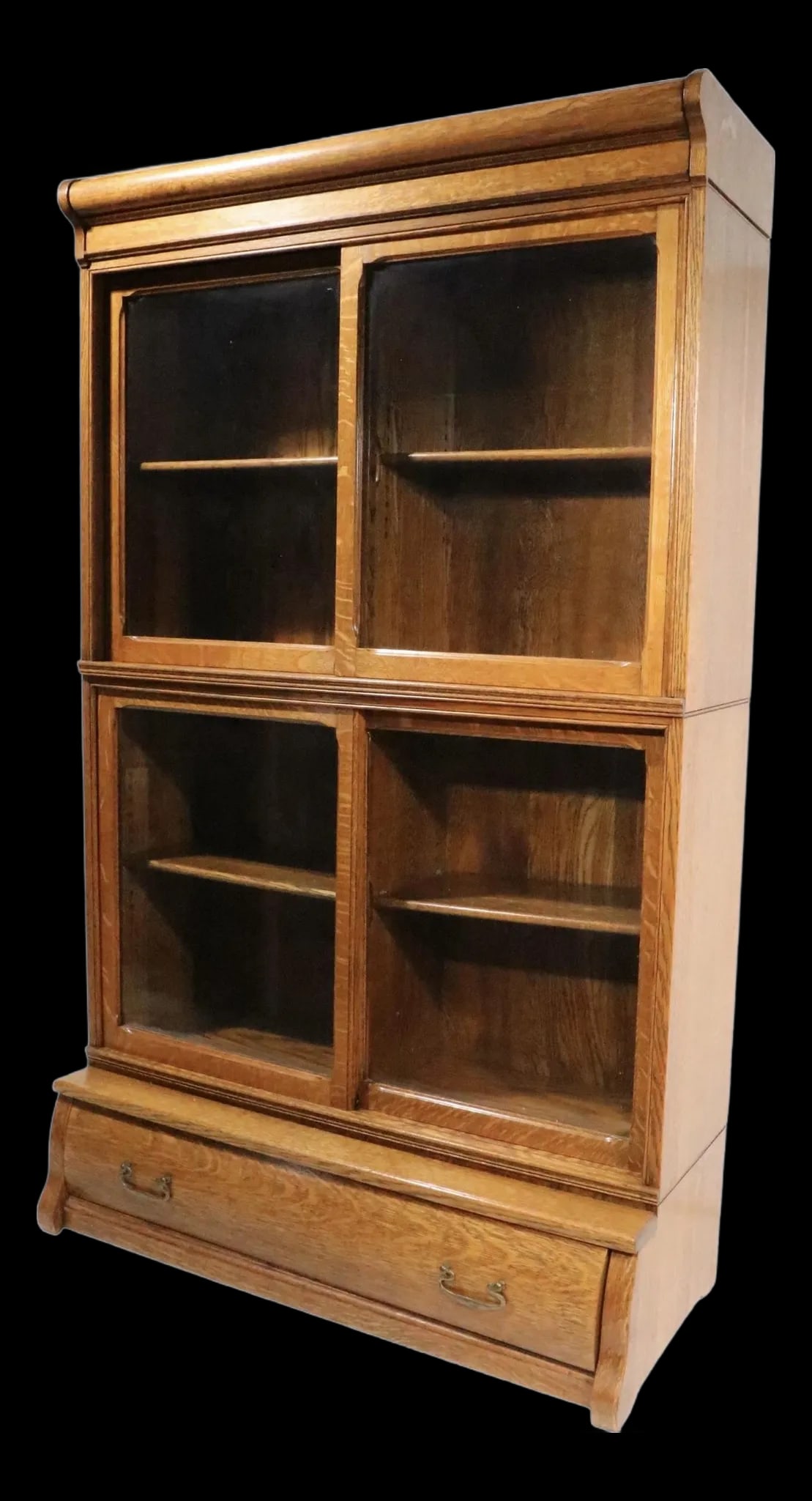 Vintage Danner Oak Sliding Glass Door Bookcase 1904-1920: Vintage Danner Oak Sliding Glass Door Bookcase 1904-1920 This exquisite Antique Oak Sliding Glass Door Bookcase, crafted by Danner, showcases the timeless beauty of classic American design. Constructe