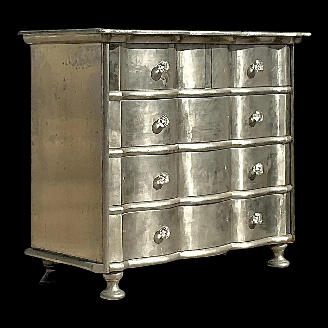 Vintage Boho Silver Leaf Chest of Drawers with Wave Front Design: Vintage Boho Silver Leaf Chest of Drawers with Wave Front Design This exquisite vintage Boho chest of drawers features a chic silver leaf finish and a stunning wave front design, perfect for adding a
