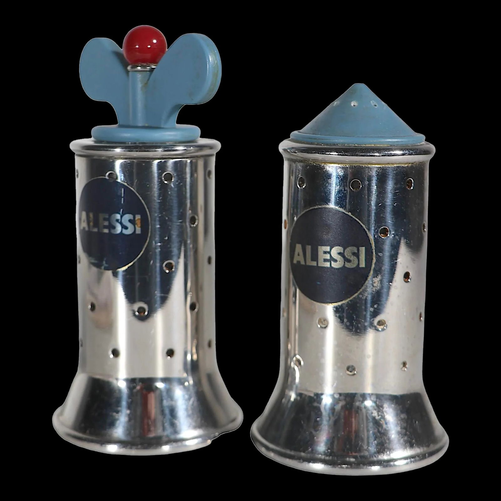 Michael Graves Memphis School Salt and Pepper Set Alessi 1980s Chrome Design: Michael Graves Memphis School Salt and Pepper Set Alessi 1980s Chrome Design This chic pair of salt and pepper shakers, designed by Michael Graves for Alessi in the 1980s, embodies the voguish style o